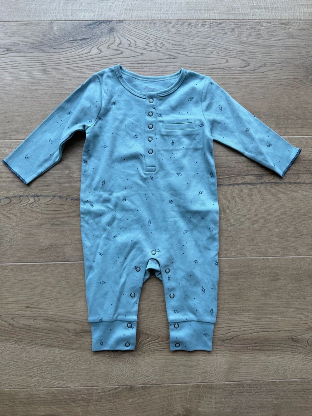 Soft Light Blue Infant One-Piece Bodysuit with Snap Closures